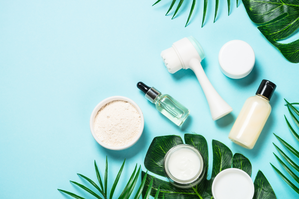 Skincare products on a green background